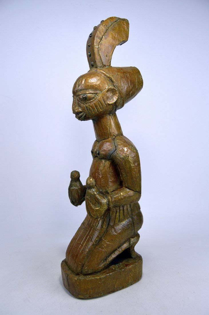 A Kneeling Yoruba Devotee Covered in Hammered Brass (1 of 6)