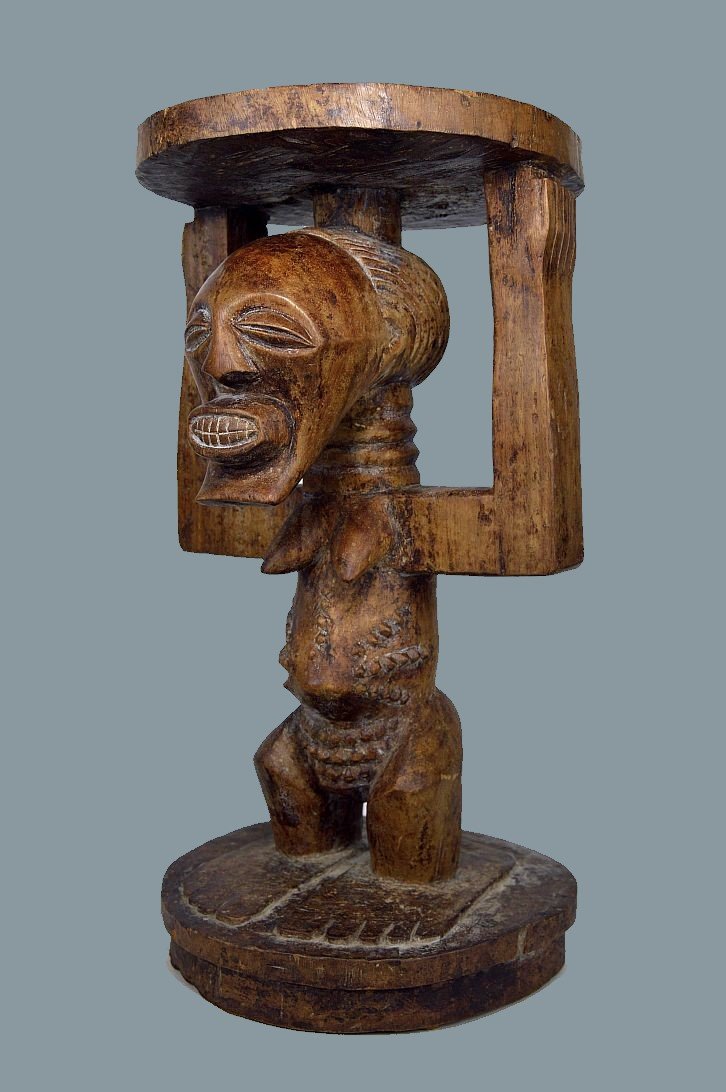 A SONGYE KIFWEBE STOOL (1 of 8)