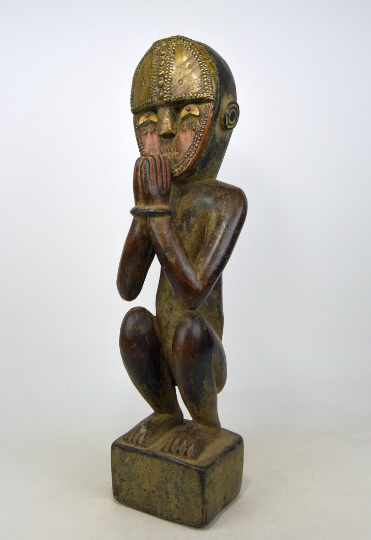 A KOTA KNEELING DEVOTEE W/ HANDS IN PRAYER (1 of 8)