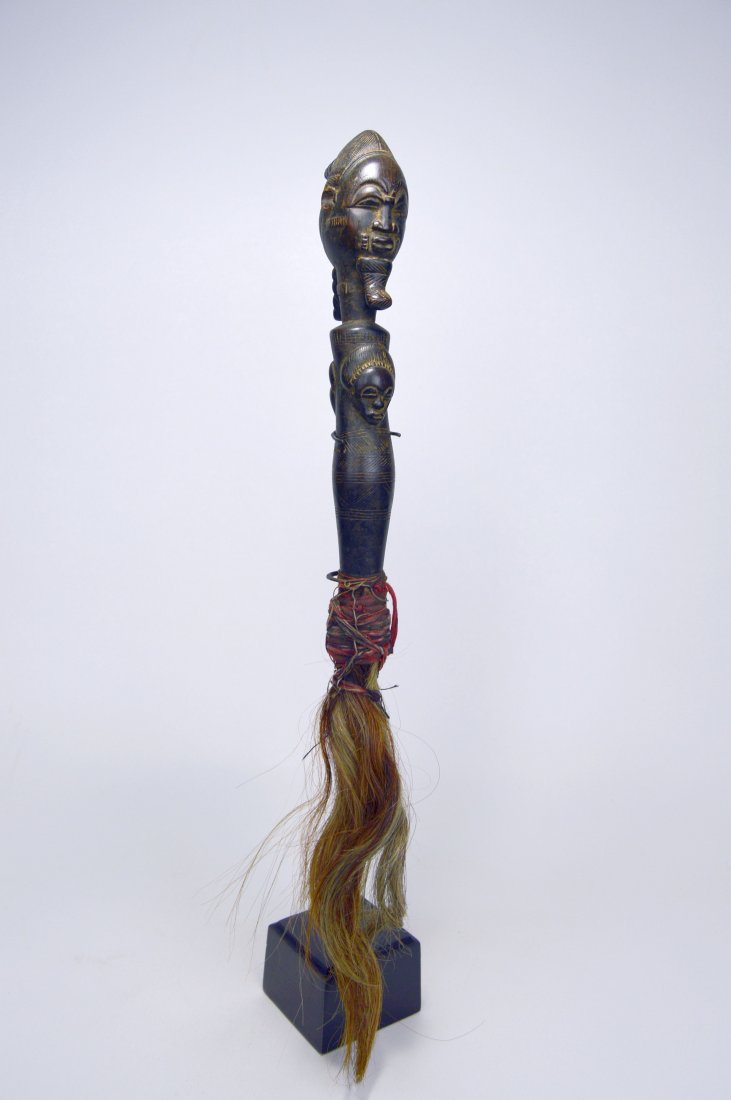 A VERY FINE BAULE FLY WHISK WITH ANCESTOR FACES (1 of 7)