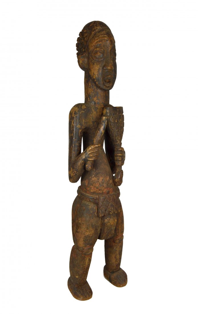 OLD BANGWA MUSICIAN SCULPTURE AFRICAN ART: This is a very old and interesting wood sculpture of a musician playing his bell, from the Bangwa or Bamileke peoples, Cameroon Africa. Carved from an incredibly dense and heavy wood with a well weath