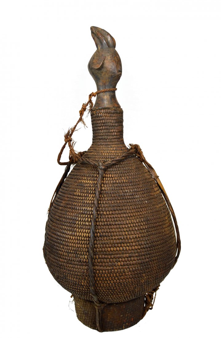 Old Mumuye Basket with Ancestor top stopper African Art: A wonderful Vintage woven rattan basket with carved wooden stopper lid in the form of an ancestral face, with incised facial designs. Mumuye peoples, Nigeria, Africa. The basket with lid measures 27 i