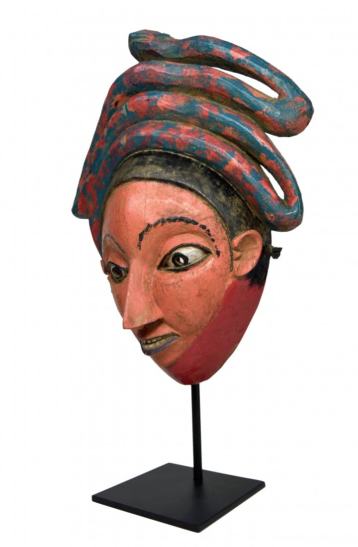 Rare Tiv Mami Wata Festival Mask, African Art: This mask is quite an uncommon example from the festivals/ masquerades of the Tiv people, Nigeria, Africa. Carved wood with a highly stylized human face, accented with a bright paint and with the addi
