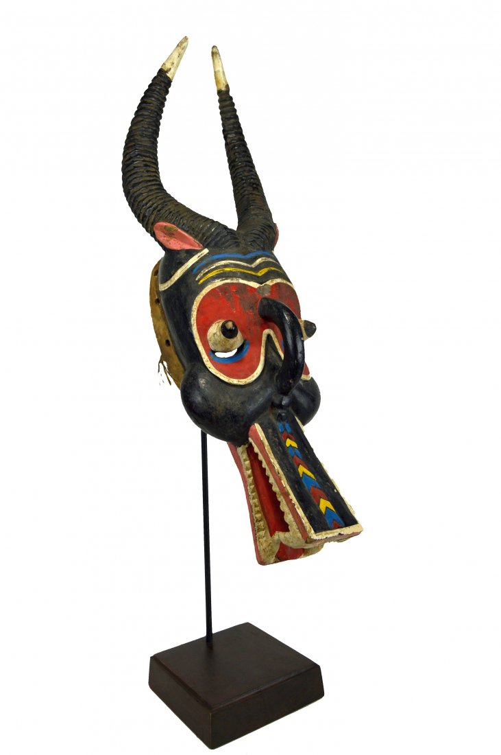 Colorful Guro Zamble African mask on stand (1 of 7)