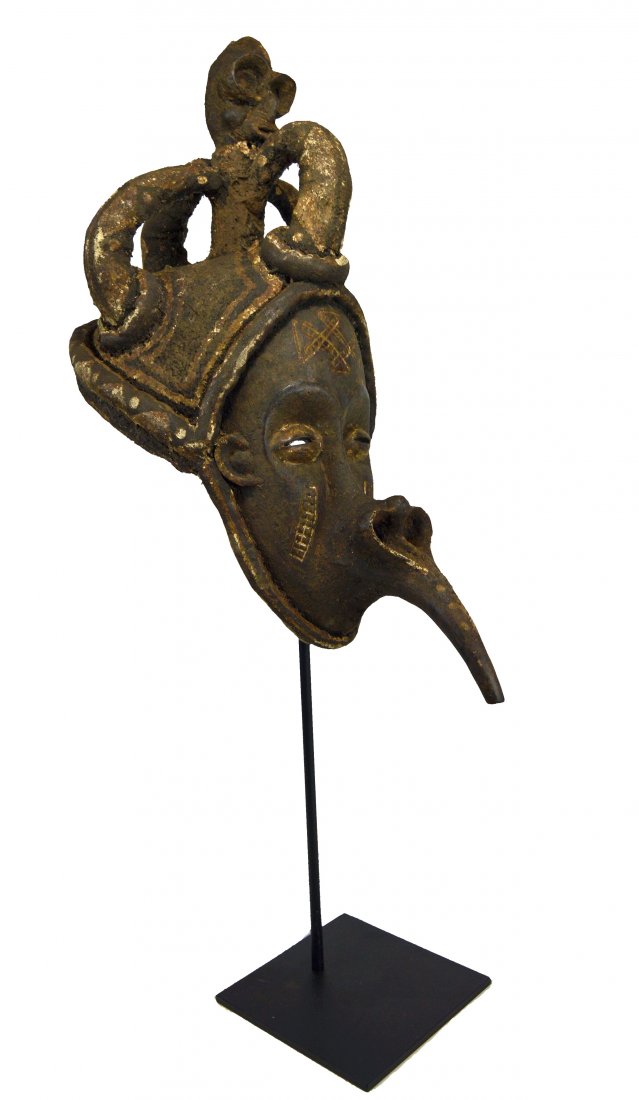 Bizarre Chokwe mask with elongated and Stylized Face (1 of 8)