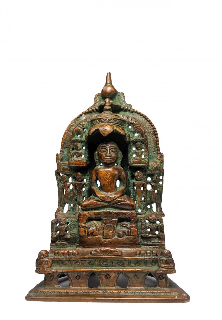 Vintage Jain Buddhist Bronze of Mahavira: This is a lovely vintage bronze sculpture of the Jain culture image of Mahavira under an ornate pagoda with attendants and highly decorative elements. The bronze has sanskrit writing incised into the 