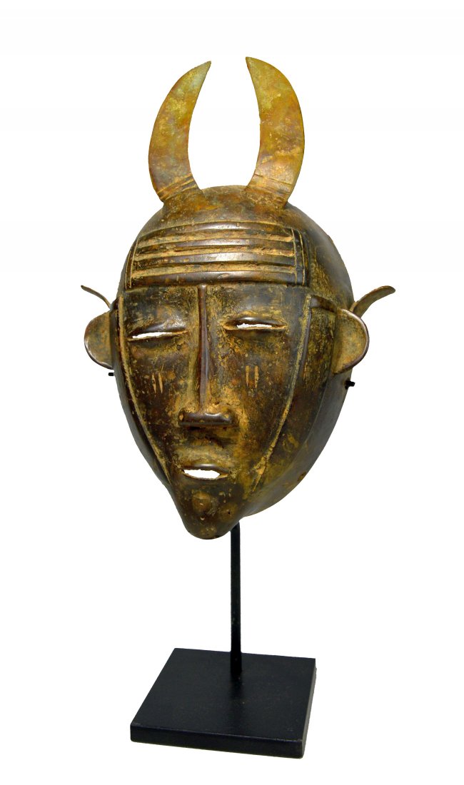 A Senufo Bronze mask on custom stand (1 of 8)