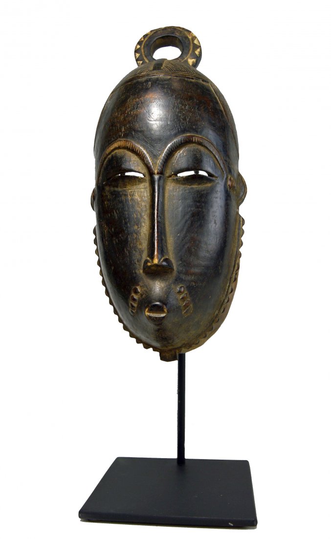 A Serene Baule African mask on custom stand (1 of 5)