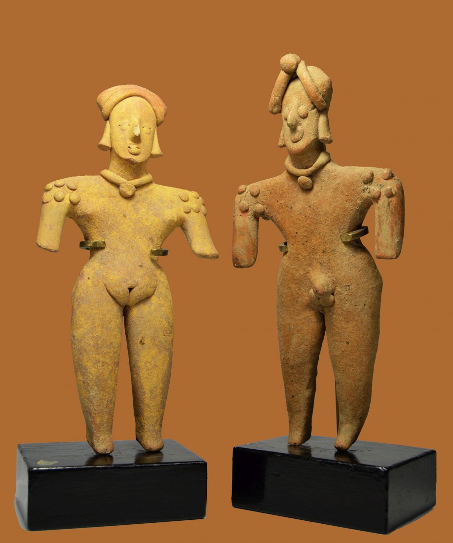 Ancient PreColumbian Colima Gingerbread Couple 300 BC: This is a rare pair of Pre-Columbian, West Mexico, Colima idols, ca. 300 BCE to 300 CE. A pair of flat pottery figures, both decorated with applied strips of pottery, in the form of standing nude man 