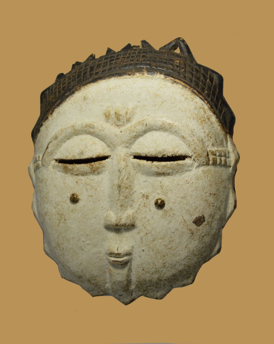 A Rare Old White Baule Sun Face mask (1 of 4)