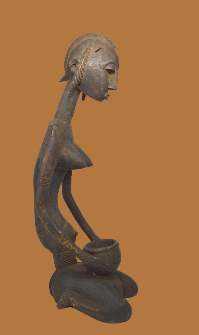 A Stylized Dogon Female African Ancestor sculpture (1 of 4)