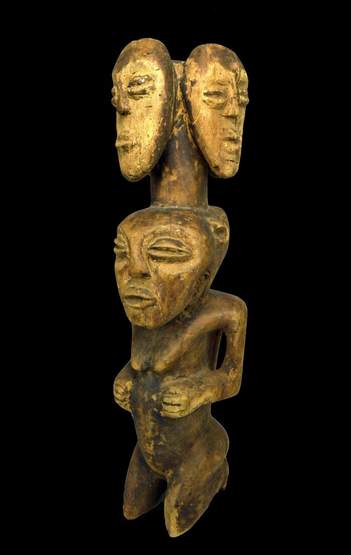 Primitive Lega Kneeling Ancestor with mask faces on top (1 of 5)