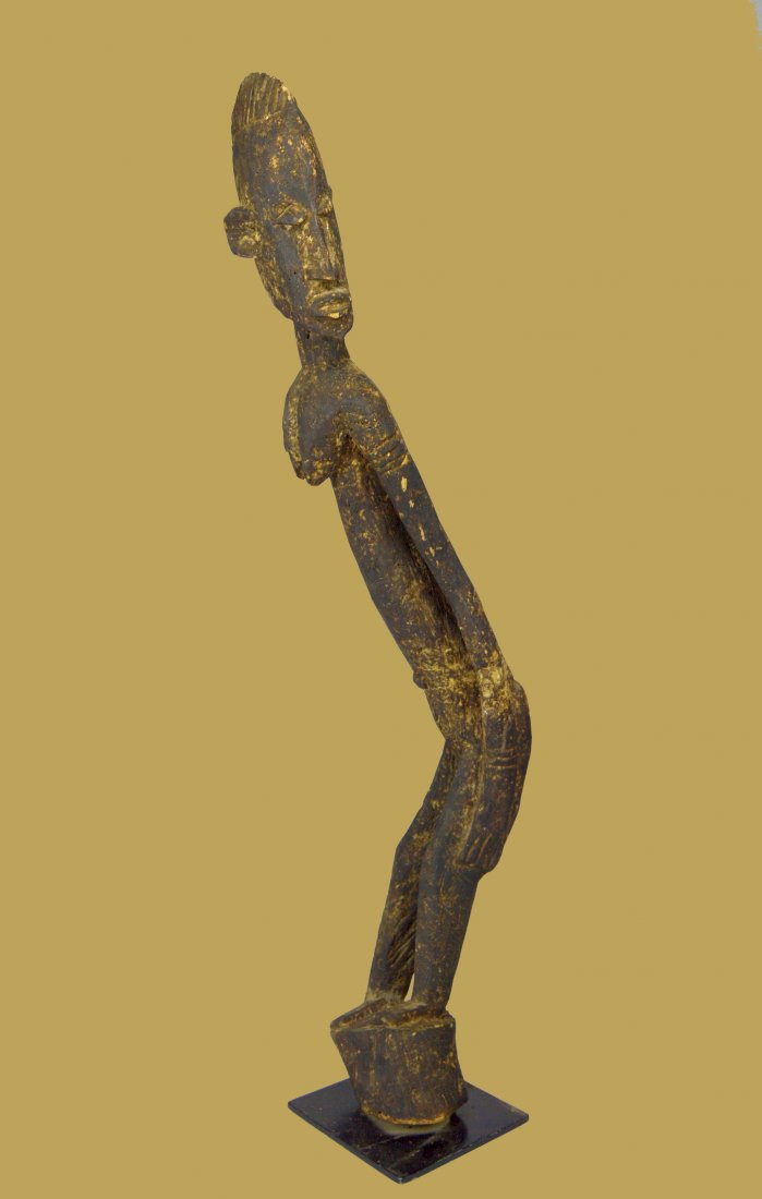 A Tall elongated and Twisted Dogon Old Man Sculpture (1 of 7)