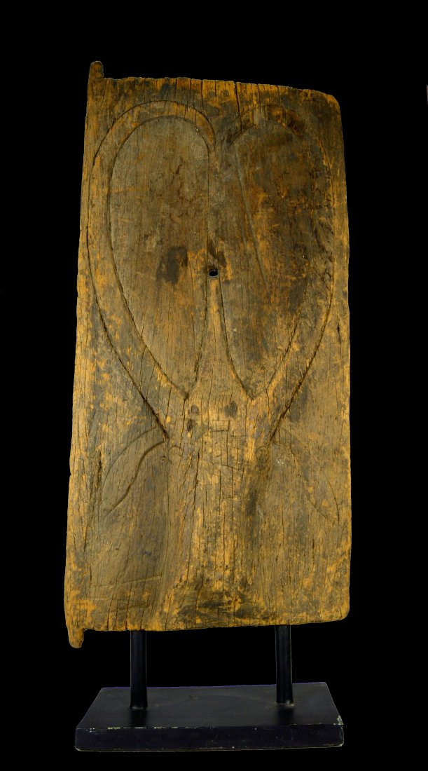 A Rare Old Tana Torajah Tomb Door, Indonesia: A rare late 19th century Shrine Door from the Tana Torajah peoples of Sulawesi island, Indonesia.Traditionally such doors were once used to protect large shrines or even tombs that were carved into th