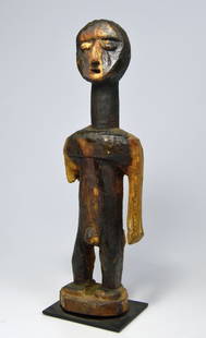 Rare Old Adan / Ewe Shrine Idol, African Art.: A carved wooden male effigy with a striking face covered in offerings and with a sweating patina. The idols right arm has been worn away. Adan or Ewe peoples, Ghana, Africa. The Idol measures 10.25