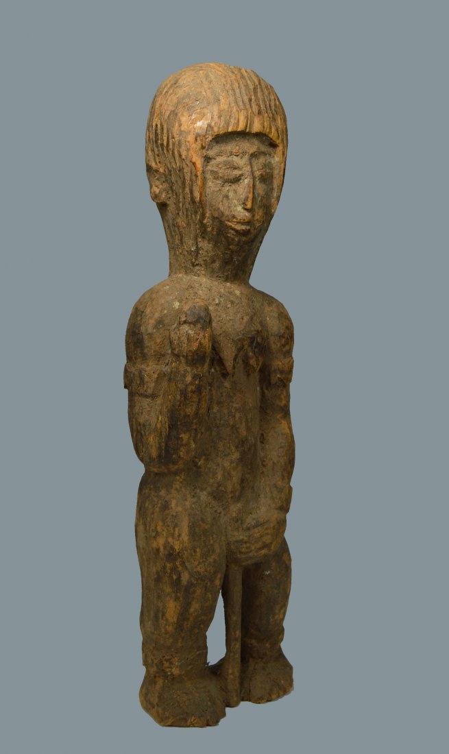 Old Igbo Shrine Idol sculpture: A carved wooden shrine idol showing many years of weathering and exposure to the elements. The Idol measures 18 inches tall. Igbo peoples, Nigeria, Africa.