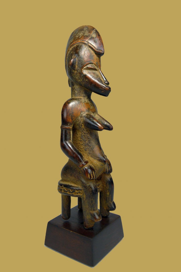 A Fine Senufo Seated Female ancestor sculpture (1 of 7)