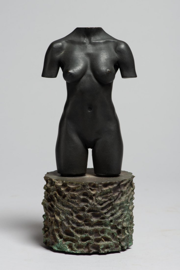 Female figure in Bronze by Robert Graham: Female torso sculpture. Bronze. H: 11”. Contemporary art by Robert Graham, Mexico. 1938-2008. Provenance: Donated by a member of The Ethnic Arts council of Los Angeles.All lots must be paid for afte