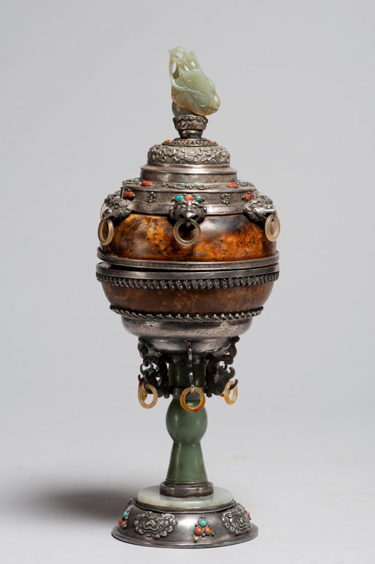 Fantastic Mongolian Communion Bowl: A very find old communion bowl embellished with ornate Silver, jade, wood, and stones. H: 13.75”. Early to mid 20th century. Mongolia. Provenance: Donated by a member of The Ethnic Arts council of L