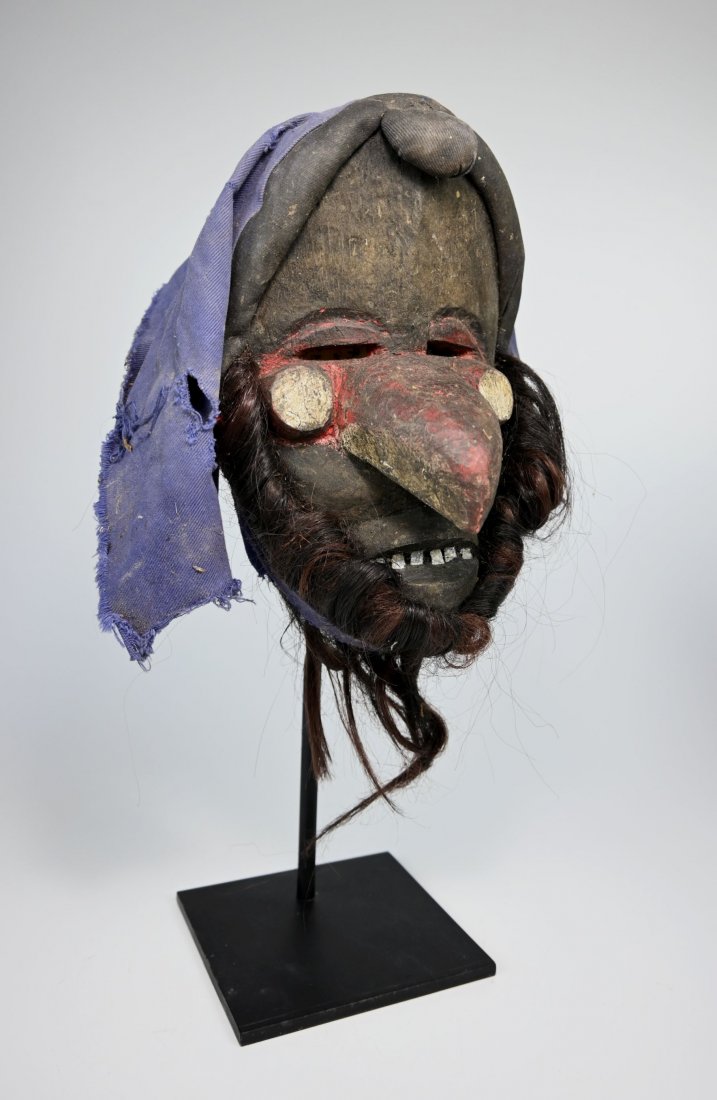 A Dan Kran Parrot Mask collected in situ prior to 1968 (1 of 5)