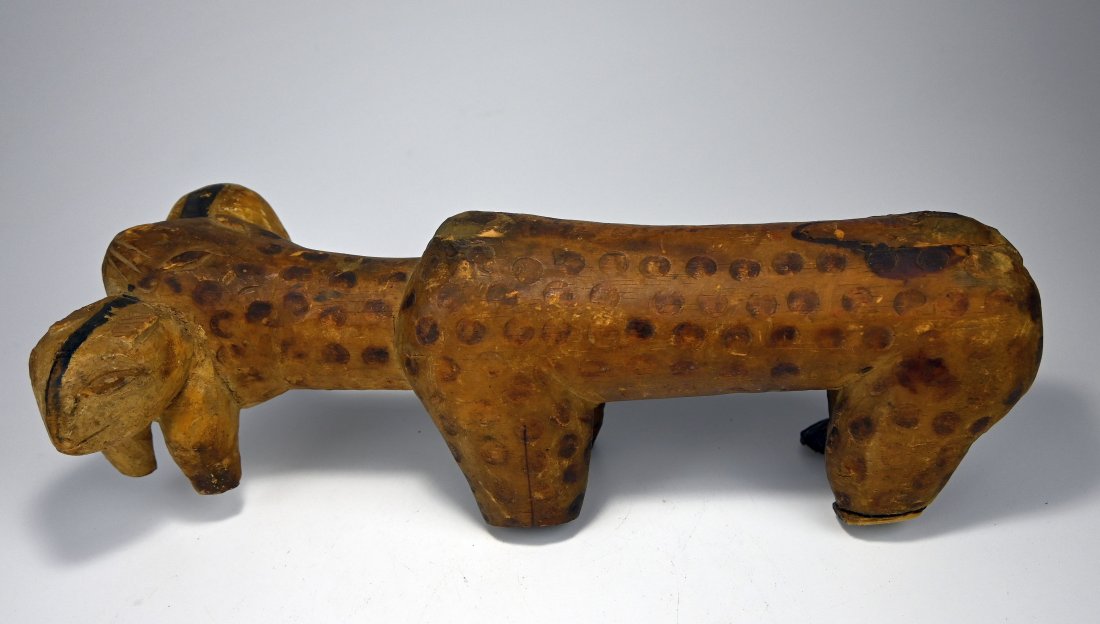 Old Baule Carved Leopard Mother carrying her young: Antique wood sculpture of a leopard with its young cub, painted and carved designs. Baule peoples, Ivory Coast, West Africa. A very old carving, likely early 20th century. Provenance: Ex Dr Brian Heal