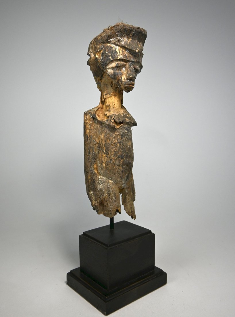 Archaic Janus Lobi Bateba Spirit Idol Ex Dr Endicott: A well weathered and eroded old shrine idol featuring two faces in either direction, a encrusted surface of ritual offerings and a overall powerful and dramatic presence. Such figures are called bateb