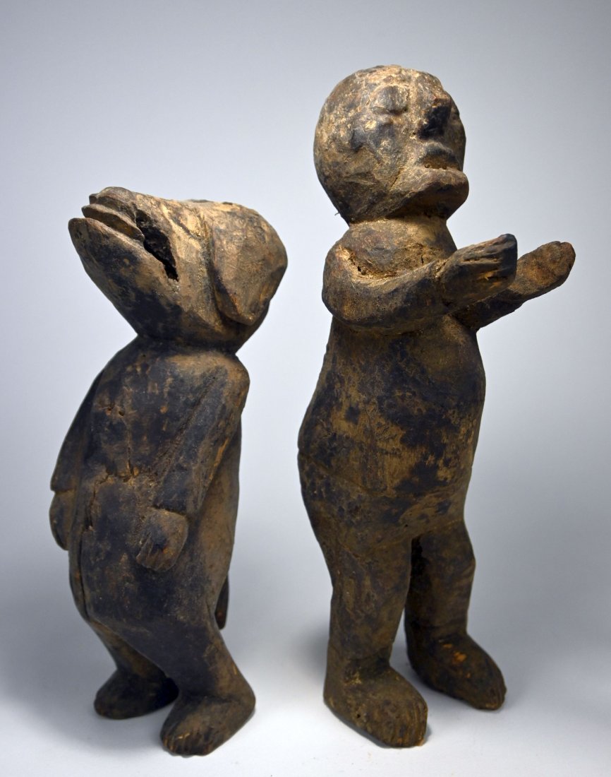 Pair of Brujos Shrine Idols From Mexico Ex Museum 1970: A Rare and Dramatic pair of carved wooden idols from a Brujos shrine, with evidence of use, you can see where candles were once embedded into the top of the heads. Such idols are known to have been us