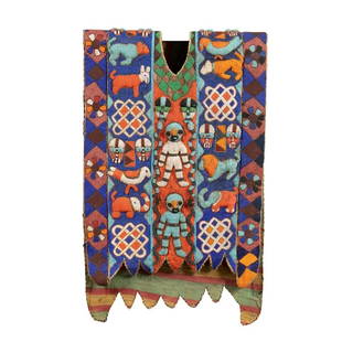 A Very fine Yoruba beaded tunic: West African, Nigeria. Yoruba beaded tunic / vest made of glass beads and cotton and depicting figures, snakes, geometric motifs, and animals. Traditionally worn on ceremonial occasions by priests ded