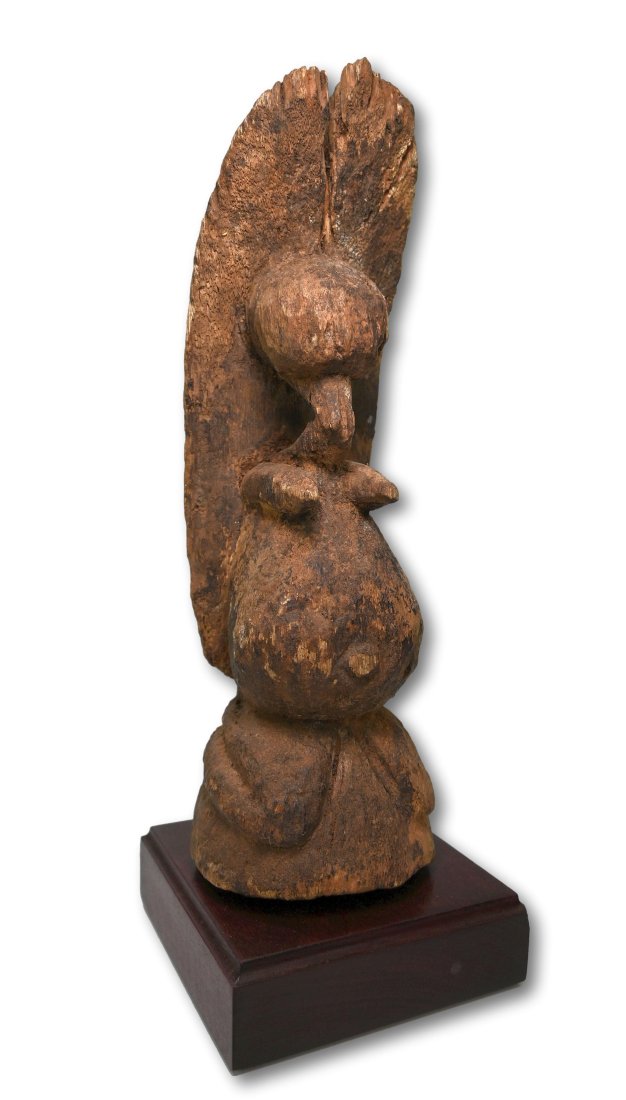 A Stylized Dogon Effigy: A carved wooden shrine sculpture with a highly stylized and abstract form, well weathered surface and overall archaic look, though it is likely not that old. Dogon peoples, Mali, Africa. The figure me
