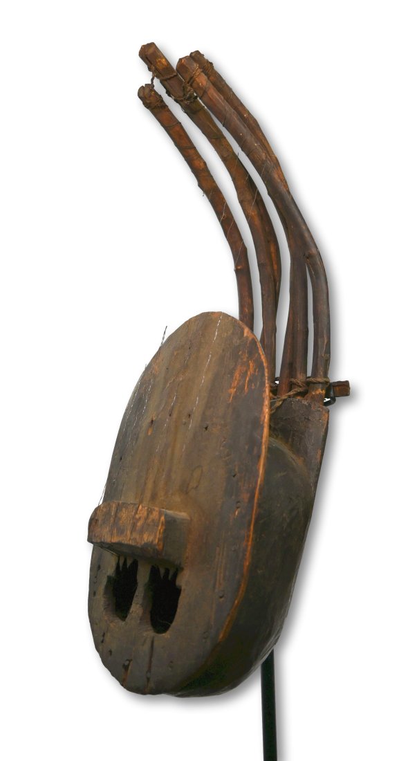 Antique Bamileke African Harp: Carved wooden musical instrument with natural branches as the neck. Known as a pluriarc harp, also called a bow lute. A stringed musical instrument of West Africa, classified as a type of lute. It has
