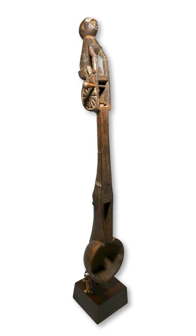 Antique Sgra-Snyan Nepal / Tibetan Lute with Monkey Finial: A tall slender carved wooden musical instrument with a finely carved wooden monkey finial and incised sanskrit writing along the neck. This Lute ( Sgra-Snyan ) no longer has strings or animal skin cov