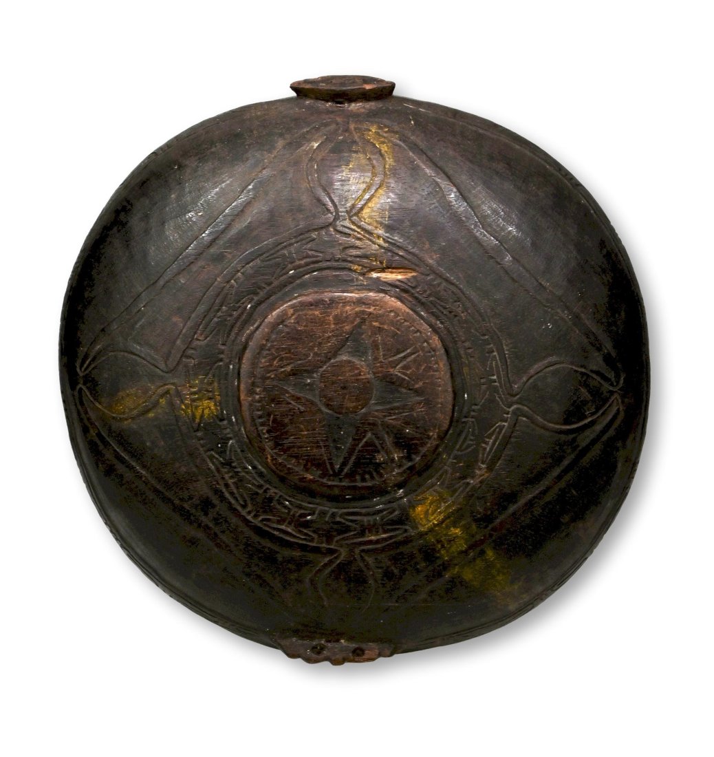 Rare Boiken Bowl Papua New Guinea: A large carved wooden feast bowl with raised tribal motifs and handle grips with incised designs. The Bowl measures 15 inches across x 2 inches deep. Boiken peoples, Oceania, Papua New Guinea, East Se