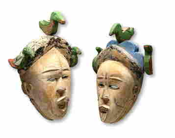 A Pair of Igbo African Masks with Avian finials (1 of 6)