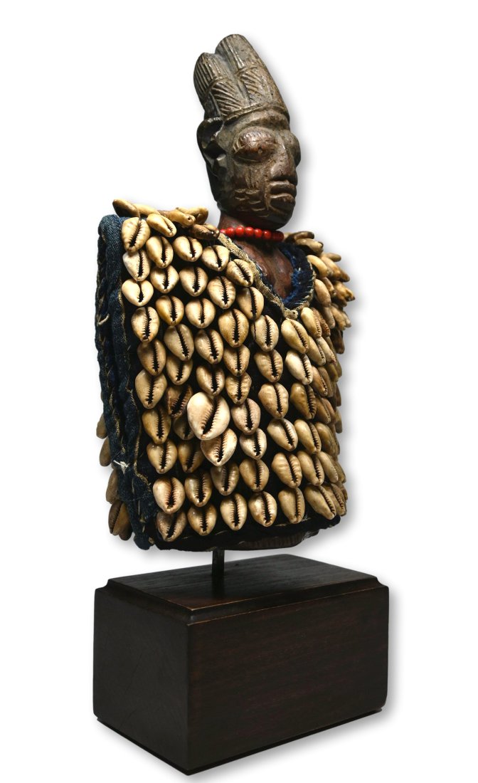 A Yoruba Ibeji Twin Idol with Regalia. (1 of 10)
