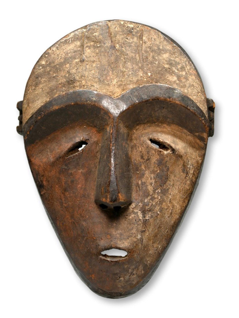 A Rare Jonga Ceremonial Mask: A very rare and uncommon carved wooden dance mask with stylized facial features, heavy brow and nose, small slit eyes and mouth and a well handled and worn surface. Jonga peoples, who live south of th