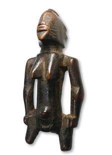 Senufo Diviners Magic Idol Ex Endicott Collection: A very old and very well worn magic idol, likely from a diviners kit, and exceedingly well handled and worn with a deep patina suggesting generations of field use as a medium to the spirit world. The