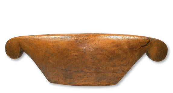 Antique Wooden Kentongan Slit Drum from Java Indonesia: A large carved wooden slit drum or idiophone used in traditional villages as a security system. Specific patterns were played to communicate to others who was on duty patrolling the village, which giv