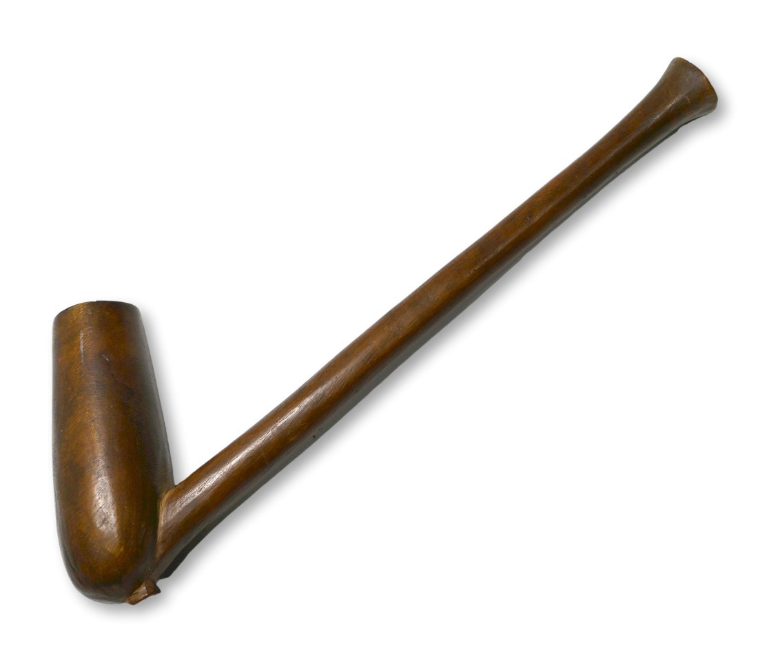 Antique Zulu Tobacco Pipe Ex Cootner Collection: A very finely carved antique wooden tobacco pipe in classic elegant form and with a well handled surface. Zulu peoples, South Africa. The Pipe measures 8.25 x 3 inches. Provenance: Ex Cootner collecti