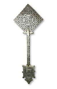 Ethiopian Silver Processional Cross Ex Museum: A very fine hand made Ethiopian Silver processional cross, hand cut from a nickel like silver into an ornate example of the Coptic faith. The cross measures 11.25 x 5.25 inches and hung as part of a