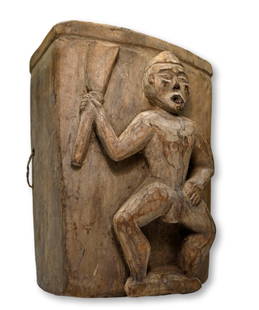 A Naga HeadHunter Basket Collected in India 1970s: A carved wood and rattan gathering basket with the image of a Naga warrior or Head hunter on the front of the basket. Field collected in India in the early 1970s as part of the Museum of Oddities