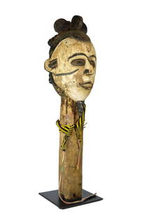 A Monumental Igbo Parade Bust: A very tall carved wooden and painted parade head or bust carried in processions that relate to ritual ceremonies and ancestor worship. Igbo peoples, Nigeria, Africa. The sculpture has been custom mou