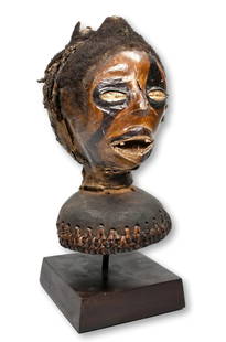 Boki Janus Skin Covered Headdress Ex Constance McCormick Fearing: This is a very rare Janus and skin covered headdress Known as Nkuambok, created by the Boki peoples, Cross River region, Nigeria, Africa. The headdress has been embellished with black paints, human ha