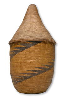 Antique Tutsi Basket with Lid Ex Nooter Collection: A beautiful antique hand woven Agaseki or Ibeseke basket from the Tutsi people of Rwanda, Central Africa. This basket measures 9.5 inches tall with it's conical lid. Provenance: The Robert and Nancy N