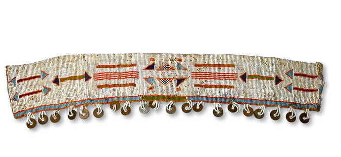 Antique Zulu Beaded Sash with Coins: A Long well made beaded sash with fine beadwork designs and embellished with many 1950s East African Copper Coins. The Sash or belt measures 25 x 5 inches. Provenance: Ex Charles Bordogna Collection,