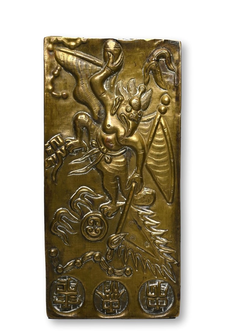Sino Tibetan Brass Scroll Weight w/ Inscriptions: a Sino-tibetan scroll weight with buddhist inscriptions. On one side we see a Garuda, the vehicle or mount (vahana) of Vishnu. On the other side a representation of a Naga or snake people. The weight 