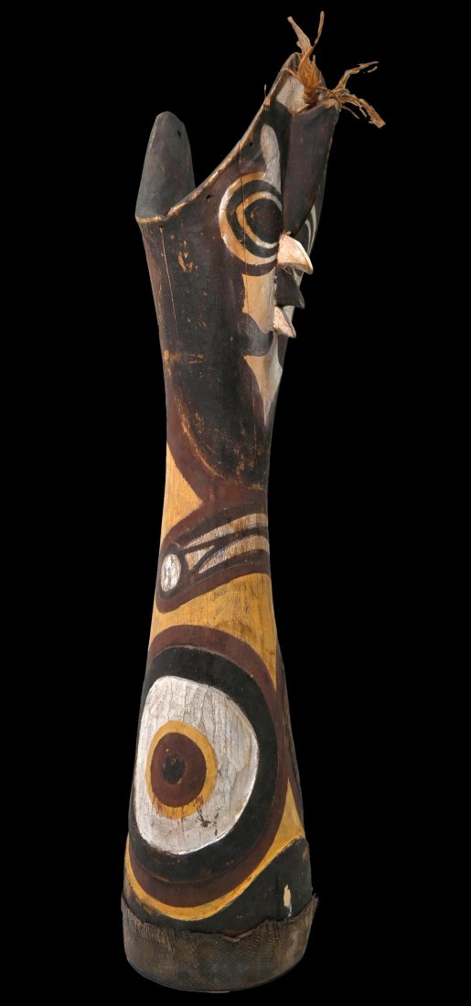 A Gogodala Painted Drum: A Gogodala revival era drum. Gogodala people, Balimo Lagoon, Western Province; Papua New Guinea. Of long hourglass form, handle attached to the central narrow portion, the drum terminating with the fa