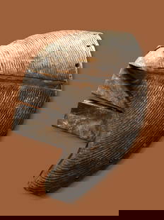 Classic Songye Kifwebe Female Mask Ex Barthels Collection: A classic carved wooden ceremonial mask in female form and weathered surface. Songye ethnic group, Kifwebe society, Congo, central Africa. The mask measures 14.5 x 8 inches. A metal display stand