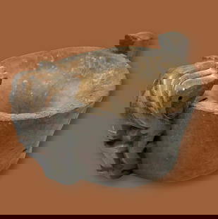 A Rare Old Batak Medicine Mortar Ex Nooter Collection: Carved from a single piece of dense and heavy wood, This rare and elegant medicine mortar was reserved for shaman or medicine men of the tribe.The Bowl is quite old, estimated at mid 19th to late