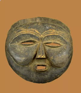 Rare Old Mbundu Sachihongo Mask collected in situ 1972: This is a very fine Old Mbunda Sachihongo masks , which are characterized by their round shape, proportionally exaggerated features, and prominent brow ridge and cheeks. This mask was part of the