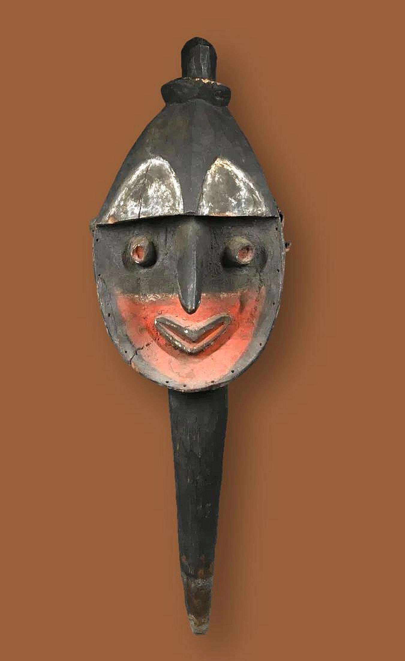 A Fine Nkuma Yena Shrine Sculpture: A Fine Nkuma Yena figure. Nkuma people, Washkuk Hills, East Sepik Province, Papua New Guinea. Of typical form, the large rounded head atop a long tapering post, the face bisected horizontally with red